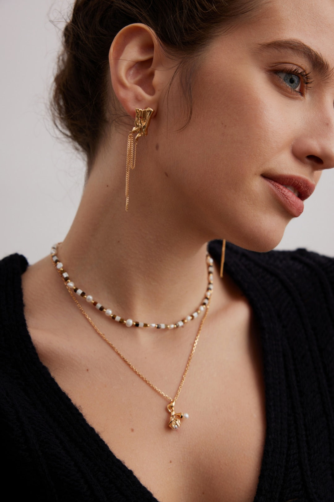 How to Layer Jewelry Without It Looking Overdone