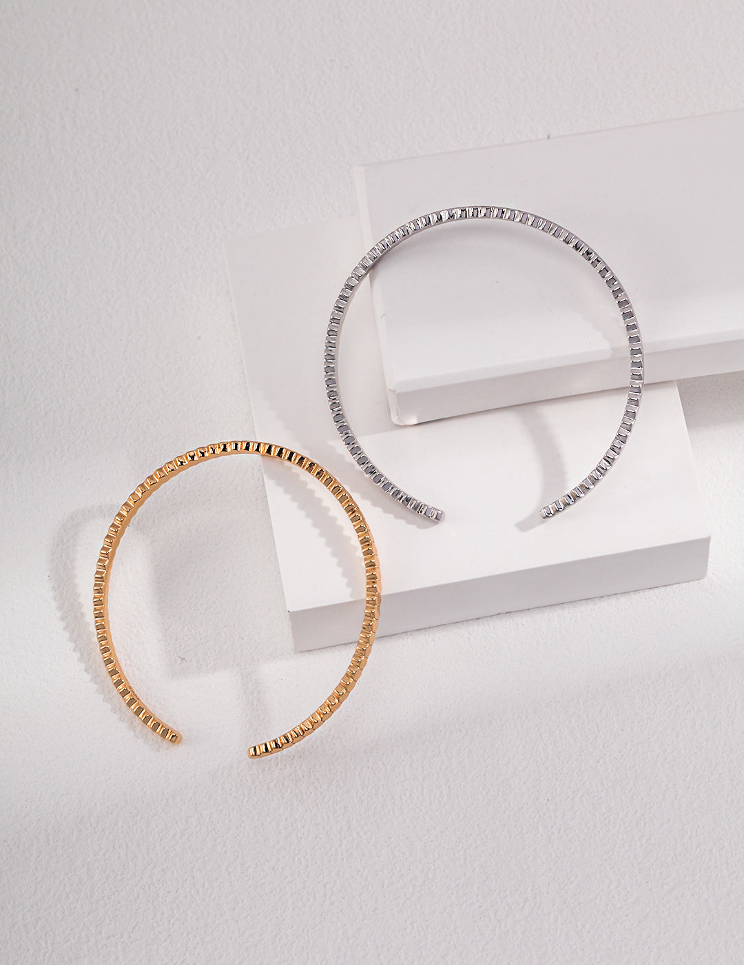 925 sterling silver fine minimal bangle in a polished silver tone