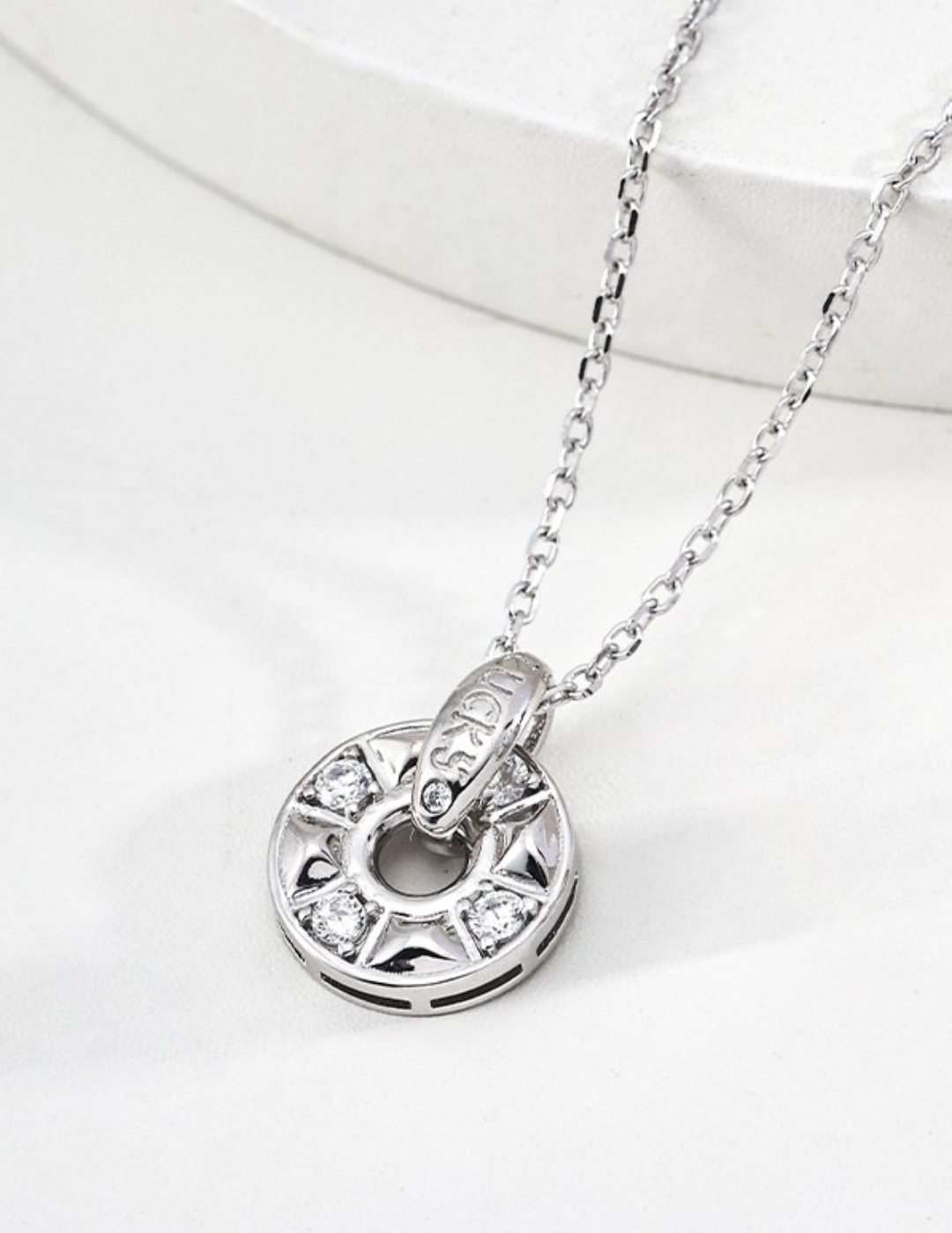 925 sterling silver cubic zirconia coin pendant necklace worn showing pendant proportion
