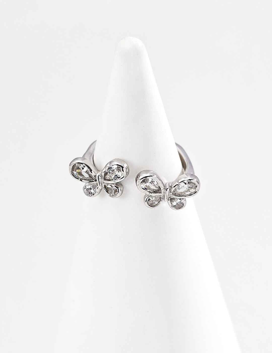 925 sterling silver butterfly CZ ring worn on finger, vintage gold tone
