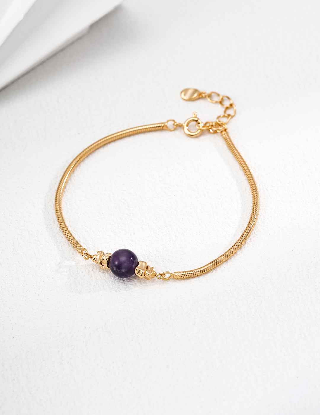 925 sterling silver chain bracelet with single amethyst stone, vintage gold-tone setting, approx. 16 cm