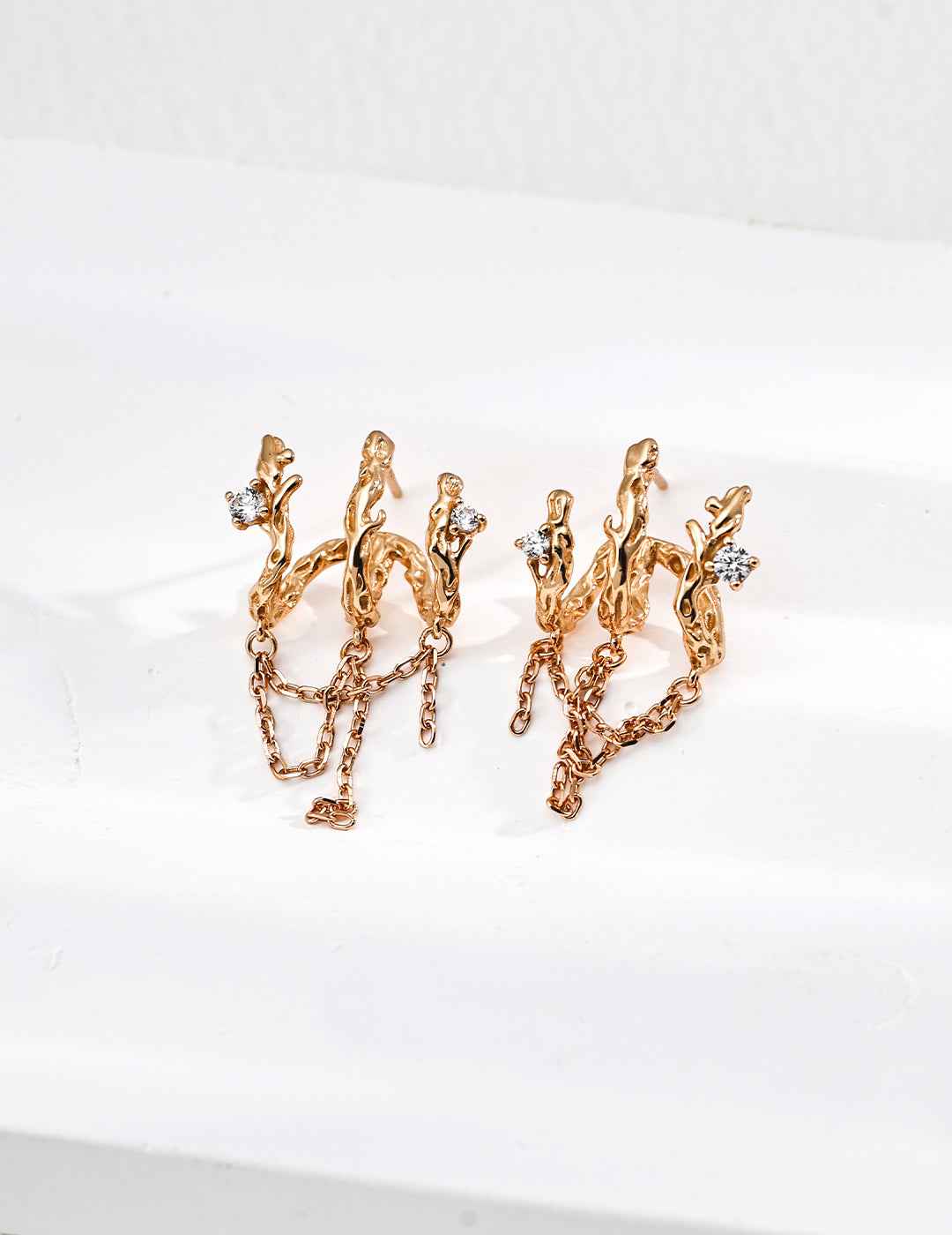 925 sterling silver branch-shaped earrings with cubic zirconia accents along irregular lines, approx. 2.5 cm
