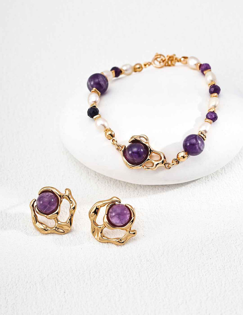 Close-up of sterling silver amethyst pearl bracelet showing stone sizes and surface detail