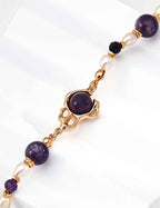 925 sterling silver amethyst and pearl bracelet worn on wrist, approx. 16 cm