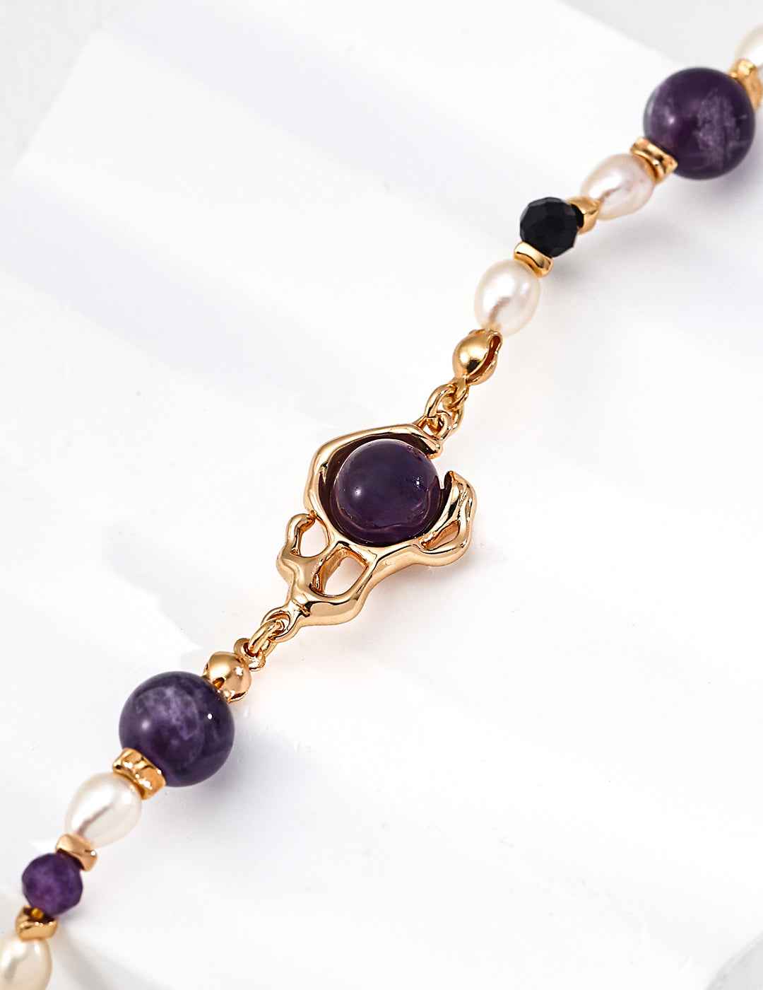925 sterling silver amethyst and pearl bracelet worn on wrist, approx. 16 cm