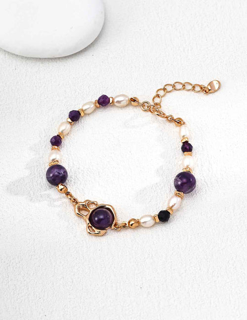 925 sterling silver bracelet with amethyst stones and natural pearl accents in alternating arrangement