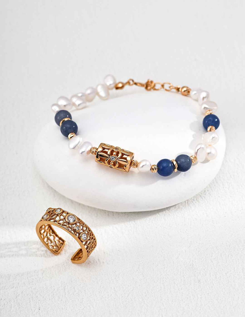 Close-up of blue aventurine and pearl details on 925 sterling silver bracelet