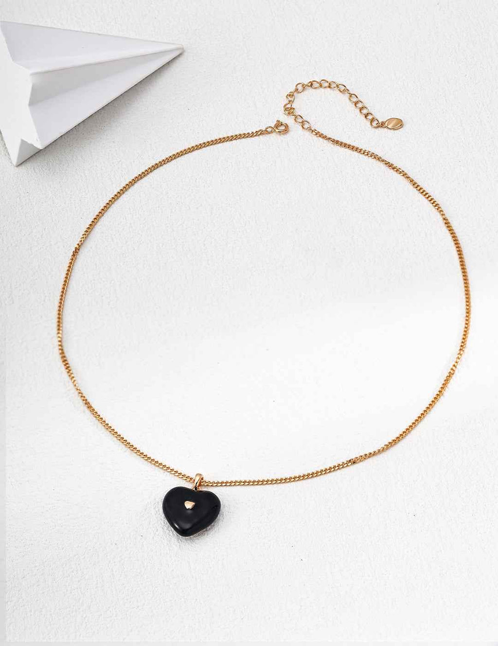 Full length view of 925 sterling silver black enamel heart necklace, 40 cm chain