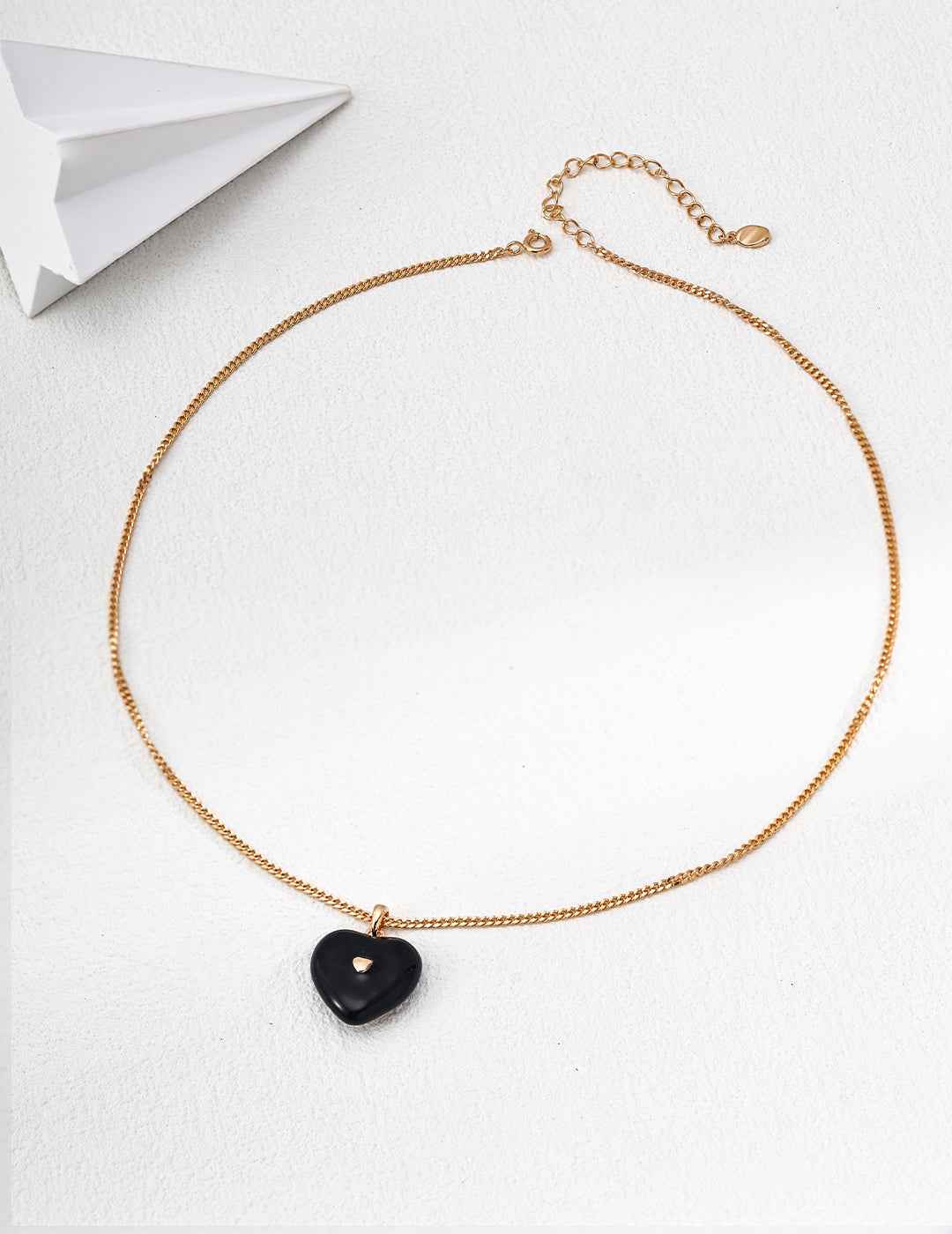 Full length view of 925 sterling silver black enamel heart necklace, 40 cm chain