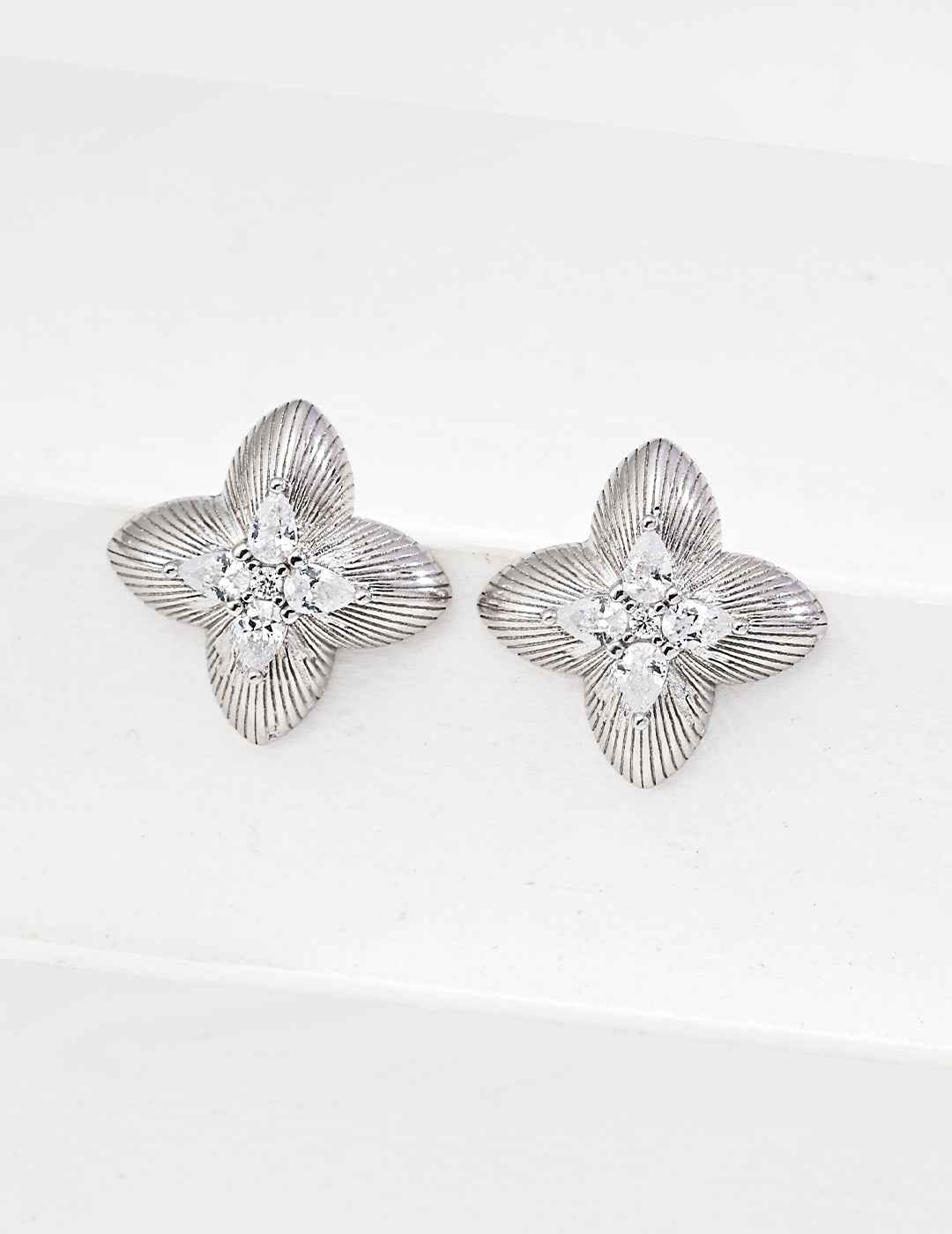 Pair of 925 sterling silver clover cubic zirconia stud earrings, front view