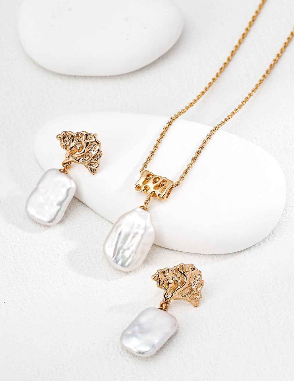 Close-up of baroque pearl pendant showing natural irregular surface and sterling silver chain setting