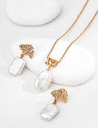Close-up of baroque pearl pendant showing natural irregular surface and sterling silver chain setting