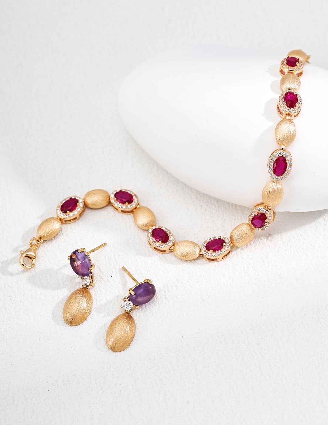 Pair of 925 sterling silver amethyst drop earrings, front view showing elongated silhouette