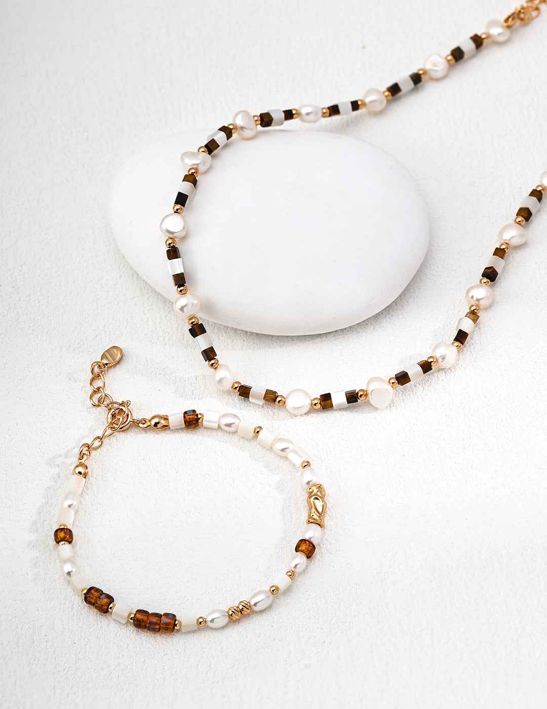Full view of 925 sterling silver colored glass and pearl bracelet with extension chain