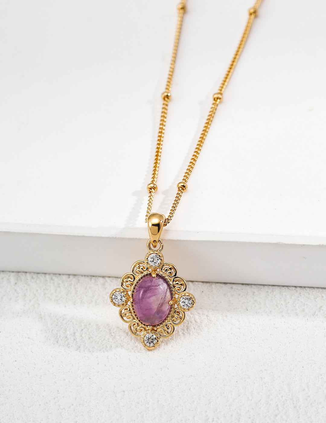 925 sterling silver pendant necklace with ornate floral frame, amethyst variant, gold-tone setting