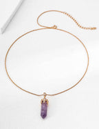 Full view of 925 sterling silver amethyst crystal point pendant necklace, vertical silhouette
