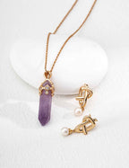 925 sterling silver amethyst crystal necklace worn, showing full 50 cm chain and pendant length