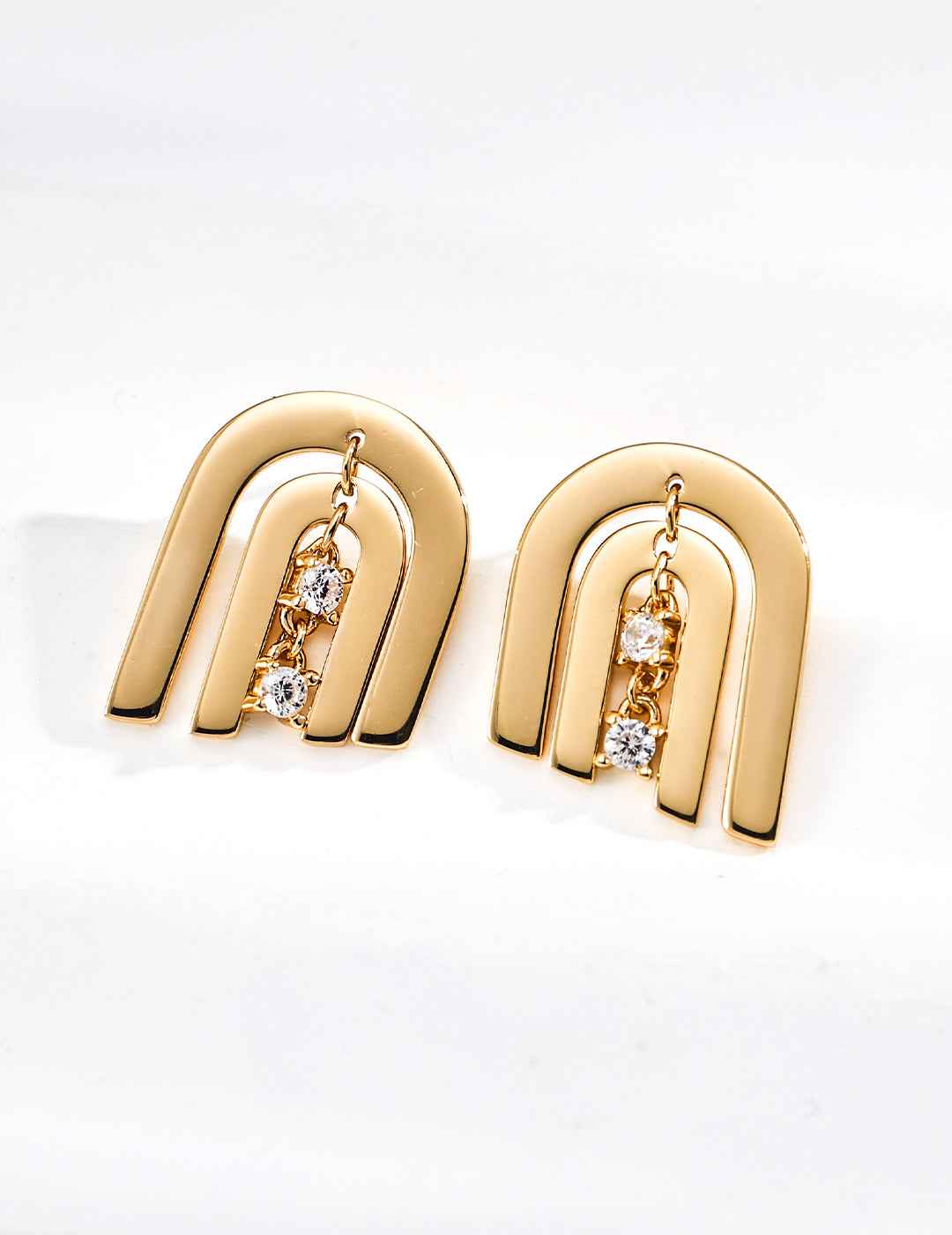 925 sterling silver arc stud earrings, side view showing layered depth