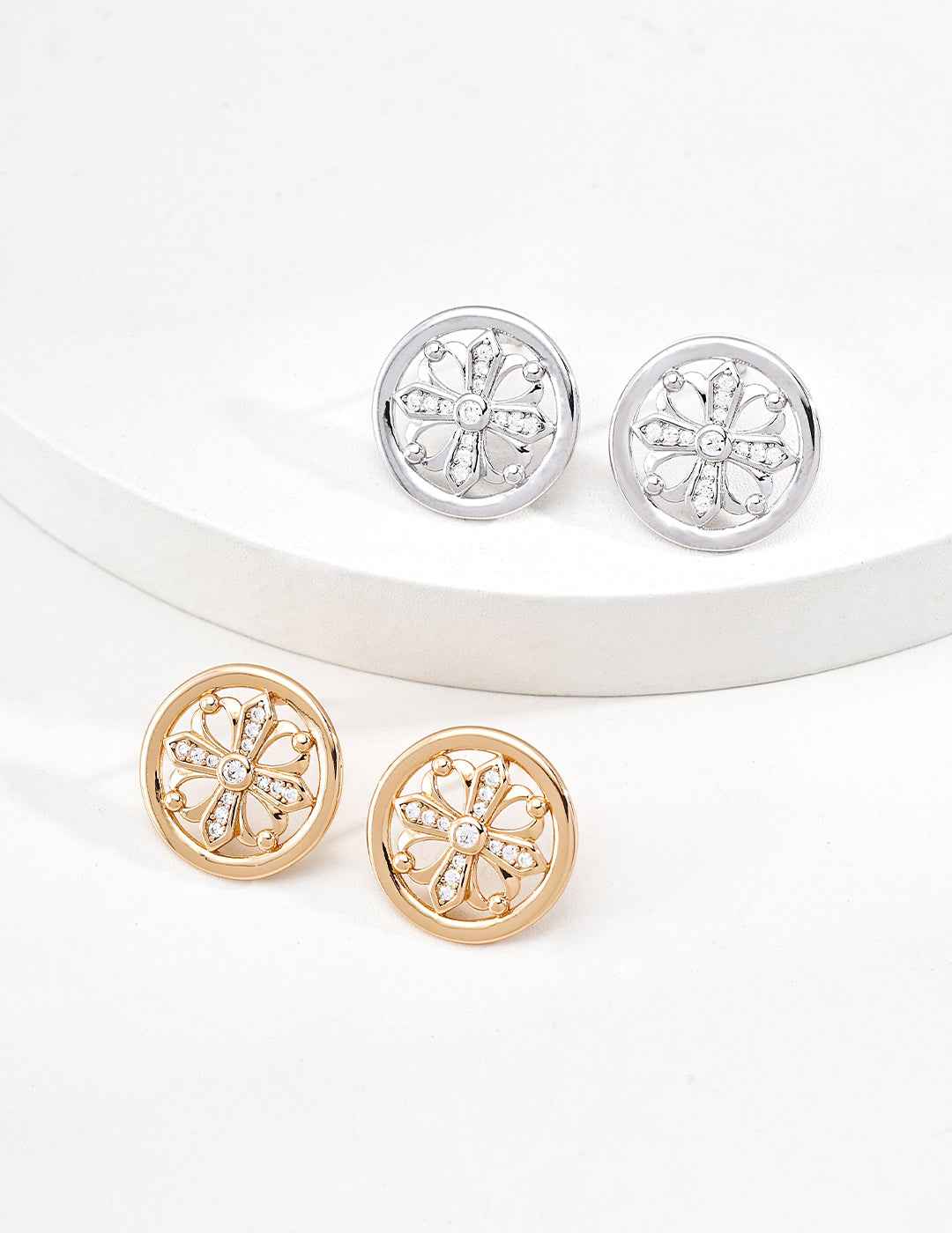 925 sterling silver stud earrings with cross-inspired floral motif and CZ accents, vintage gold tone, approx. 2 cm