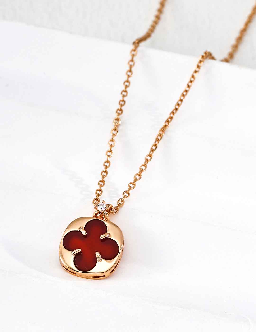 925 sterling silver clover pendant necklace showing red agate, shell and lapis lazuli variants