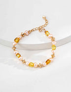 925 sterling silver beaded bracelet with natural amber and freshwater pearls, gold-tone hardware