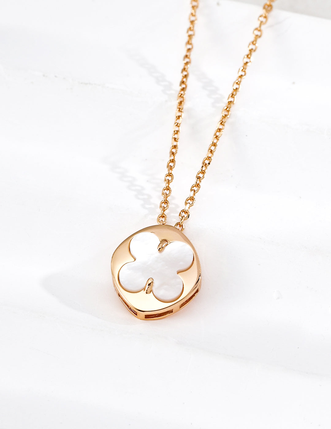 925 sterling silver clover pendant necklace showing lapis, mother of pearl and agate variants