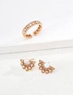 Close-up of sterling silver CZ open band ring showing stone and metal segment pattern