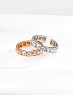 925 sterling silver open band ring with alternating cubic zirconia accents, gold tone, adjustable size 16