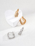 925 sterling silver stud earrings with double wave silhouette and cubic zirconia accents, gold tone, approx. 1.5 cm