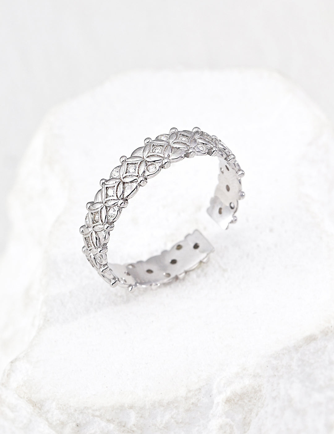 925 sterling silver cubic zirconia textured ring worn on finger showing adjustable band