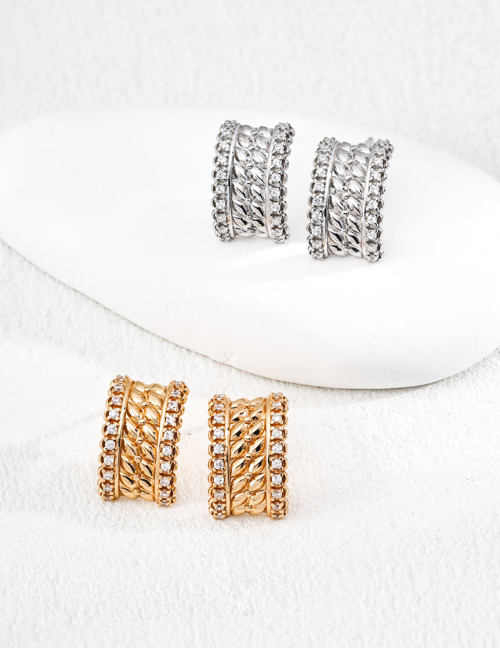925 sterling silver stud earrings with layered mesh-like textured surface and CZ accents, gold tone