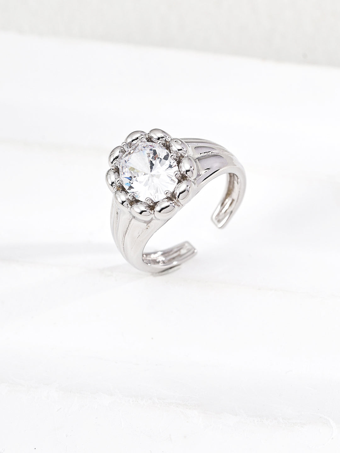 925 sterling silver geometric CZ ring worn on finger showing adjustable open band