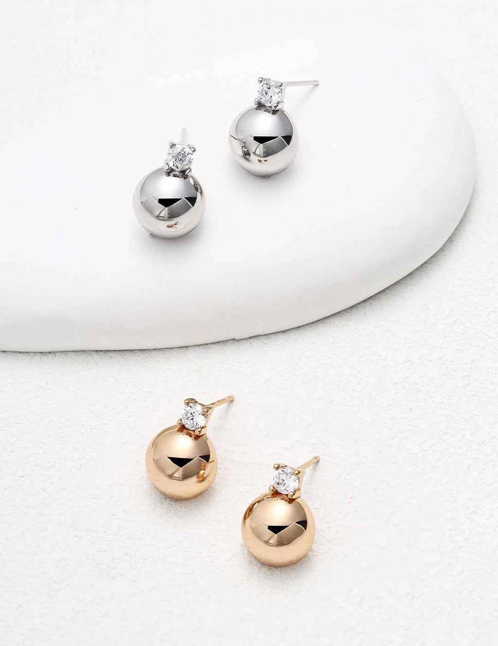 Pair of 925 sterling silver CZ ball stud earrings, front view