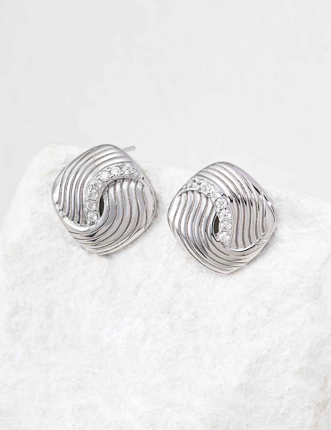 925 sterling silver cubic zirconia twisted stud earrings, silver tone version