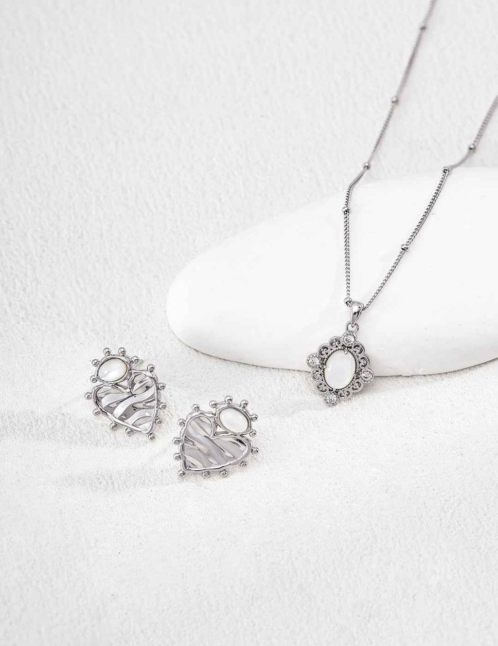 925 sterling silver stud earrings worn on model