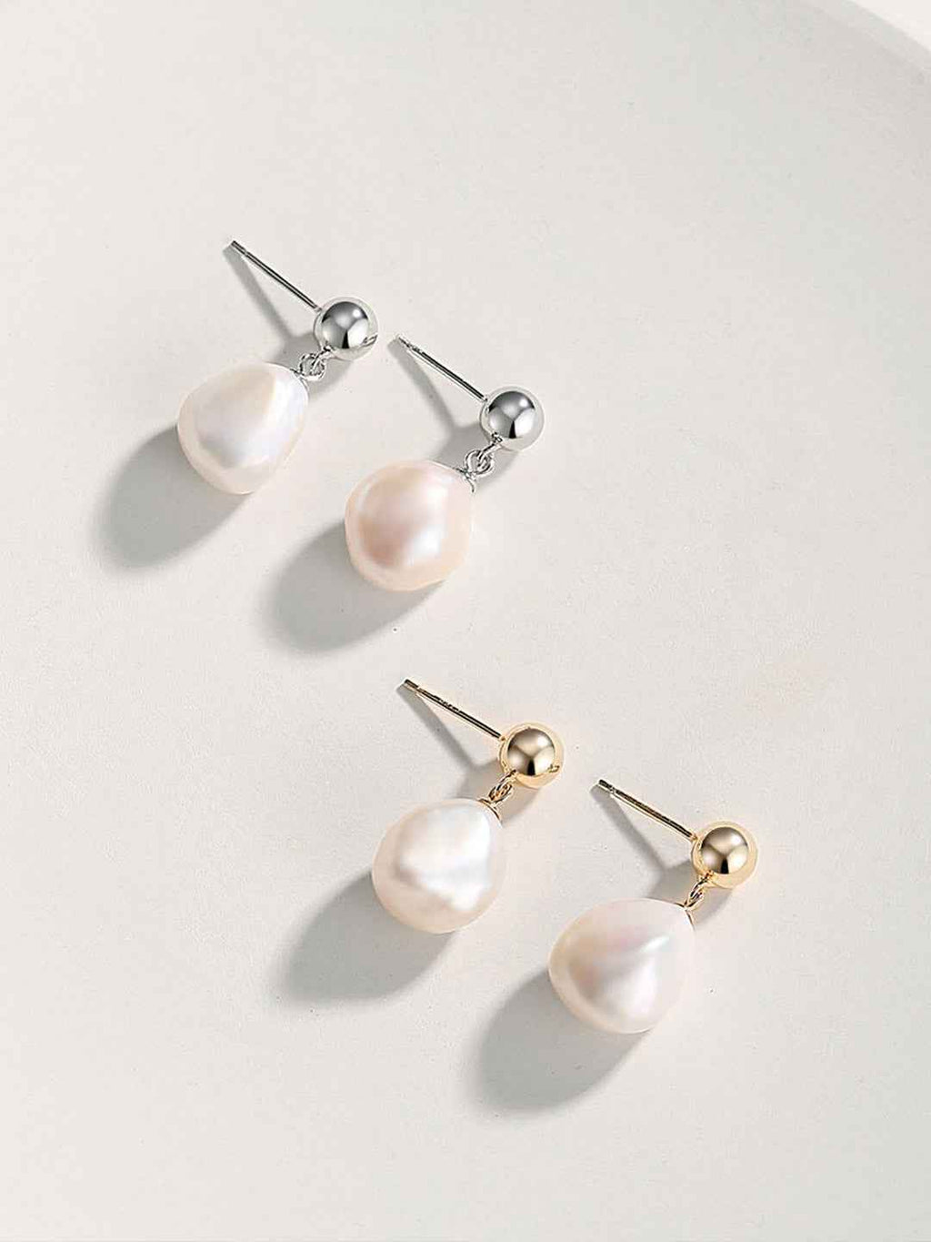 Pair of baroque pearl drop earrings in vintage gold tone, 925 sterling silver