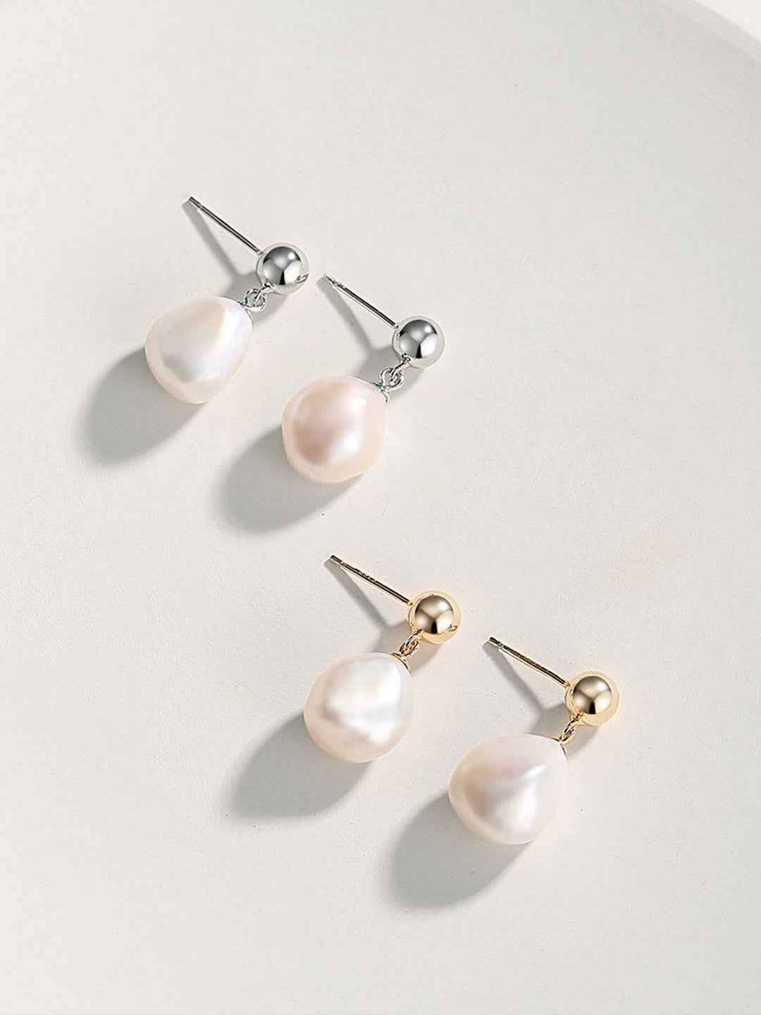 Pair of baroque pearl drop earrings in vintage gold tone, 925 sterling silver