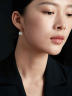 925 sterling silver hoop earrings worn on model