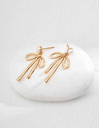925 sterling silver bow-shaped drop earrings with natural pearl drops, vintage gold tone, approx. 4 cm height