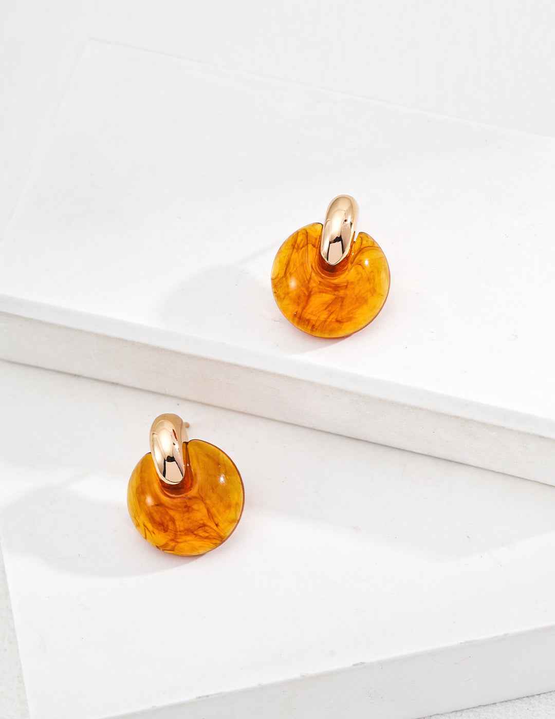 925 sterling silver resin hoop earrings, worn view showing size and proportion